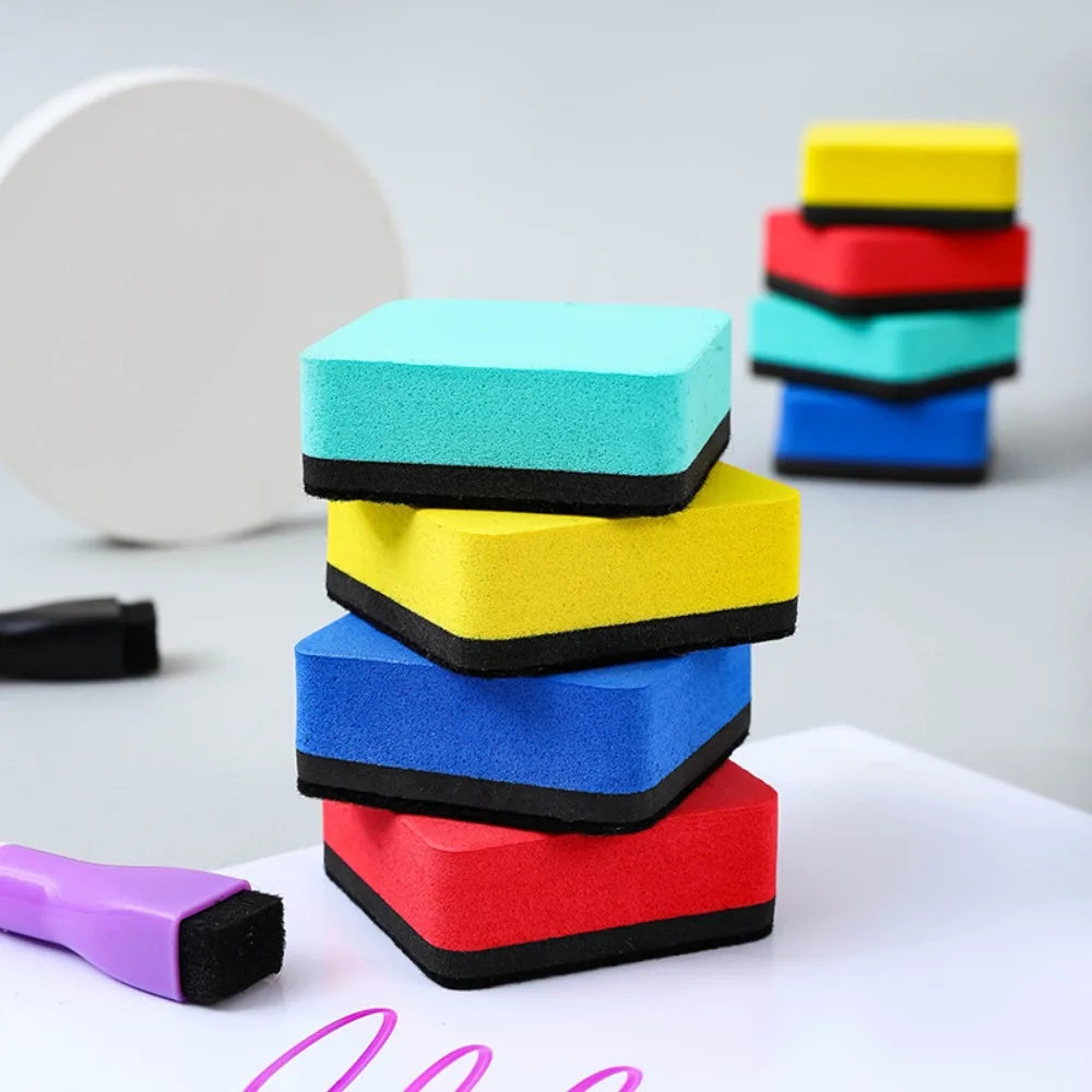 A stack of five colorful magnetic whiteboard erasers made of EVA felt pads in various shades of blue, green, yellow, and red.