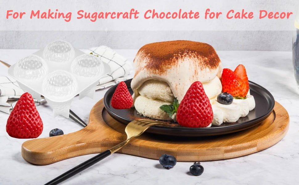 A strawberry silicone mold is shown next to a cake decorated with strawberry cream and chocolate for cake decor.