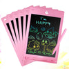 A stack of pink 8.5-inch LCD writing tablets for kids with a stylus pen displaying the text I'm happy.