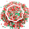 A pile of red, green, and white polymer clay sprinkles mix for slime decor and DIY craft accents.