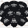 A set of black funny family matching t-shirts with text like I'm the grandpa, uncle, grandma, mom, dad, and youngest.