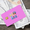 A pink card featuring cute illustrations of a strawberry and shortcake character on a background of US currency.