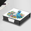 A flat, rectangular storage box featuring a diamond painting design of a peacock with colorful floral accents.