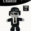 A black and gray plush toy resembling a character from a slasher game wearing a hat and sunglasses.