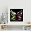 A framed print featuring a dramatic waterfall landscape with winged designs on a black background.