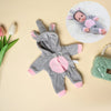 A gray jumpsuit outfit for a doll featuring pink accents and ears, displayed on a light background.
