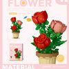 A set of plastic flower blocks in red and pink colors used to build a model bouquet.