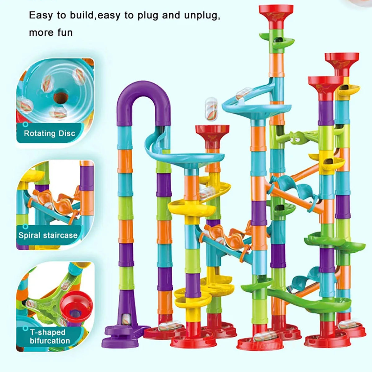 A colorful set of DIY marble run building blocks featuring a rotating disc, spiral staircase, and T-shaped bifurcation