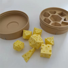 A set of yellow cheese dice cubes and a matching tan carrying case for game night.