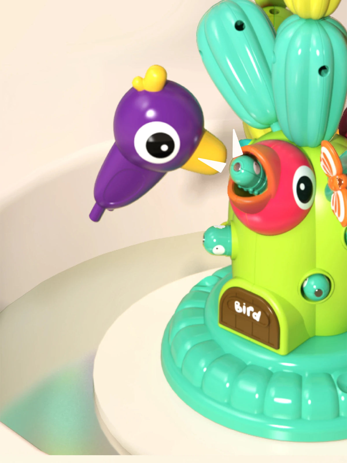 A colorful set of cactus building blocks featuring purple and yellow bird figures.