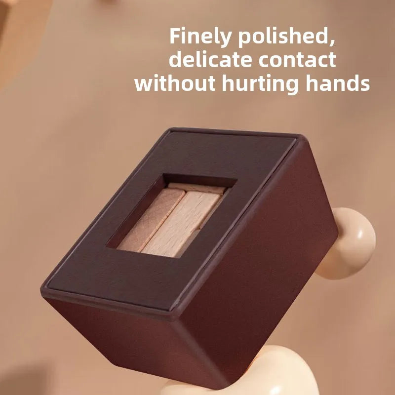 A dark brown wooden magic box puzzle with a slot for a 6-piece 3D block challenge.