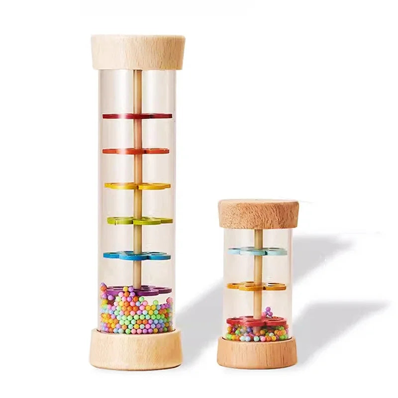 A wooden rain sound shaker toy with colorful plastic beads inside, designed for early learning.
