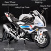 White and black die-cast model motorcycle showing various features like shock absorption, fuel tank, and steering components.