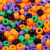 A large collection of colorful pony beads in various shades including orange, purple, green, and black.