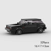 A black classic rally car building block set with a glass roof and detailed exterior features.