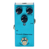 A teal guitar effects pedal with gain and volume controls, featuring a crunch distortion switch.