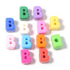 A collection of colorful acrylic alphabet beads shaped like the letter B arranged in a circle.