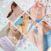 Close-up of hands and neck displaying various letter and number acrylic beads used for jewelry making.