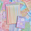 A colorful assortment of fantasy aesthetic sticker book pages and paper designs for journaling and scrapbooking