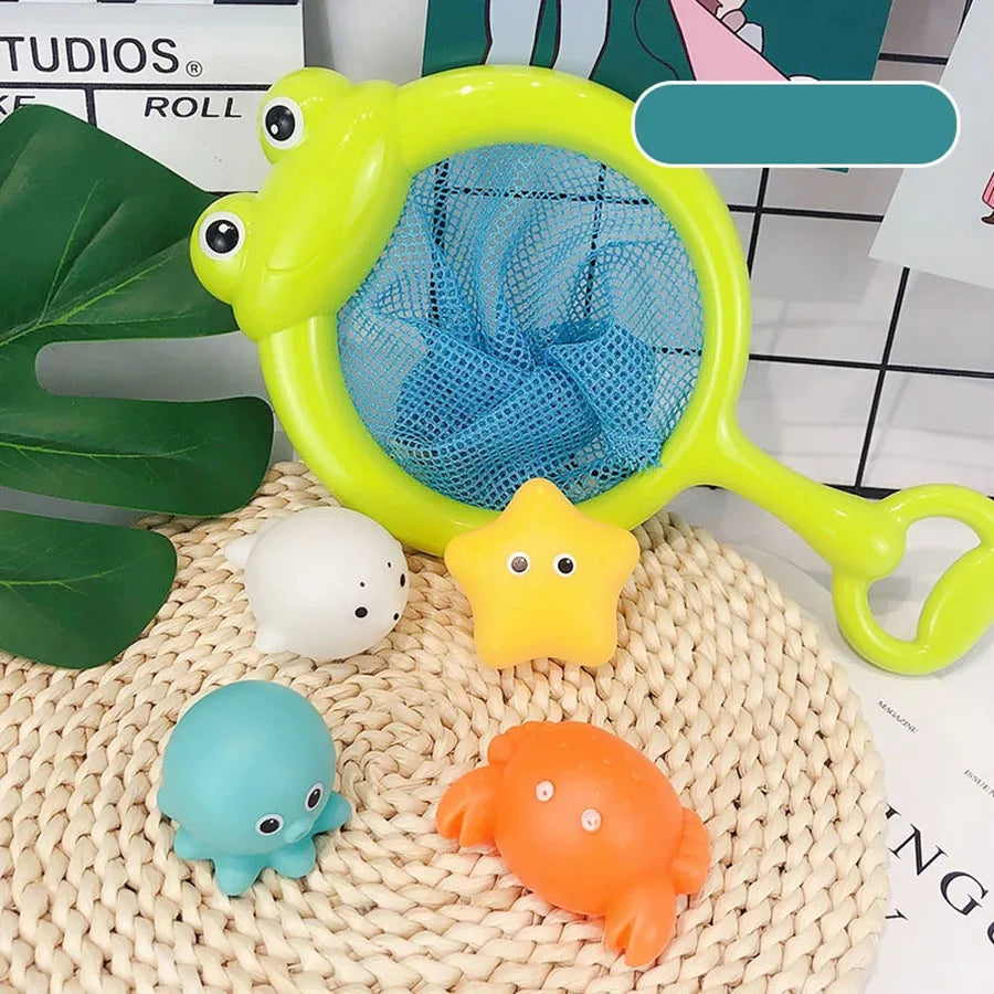 A yellow light-up bath toy set featuring a large yellow ring and a blue mesh insert, surrounded by small plastic sea creature