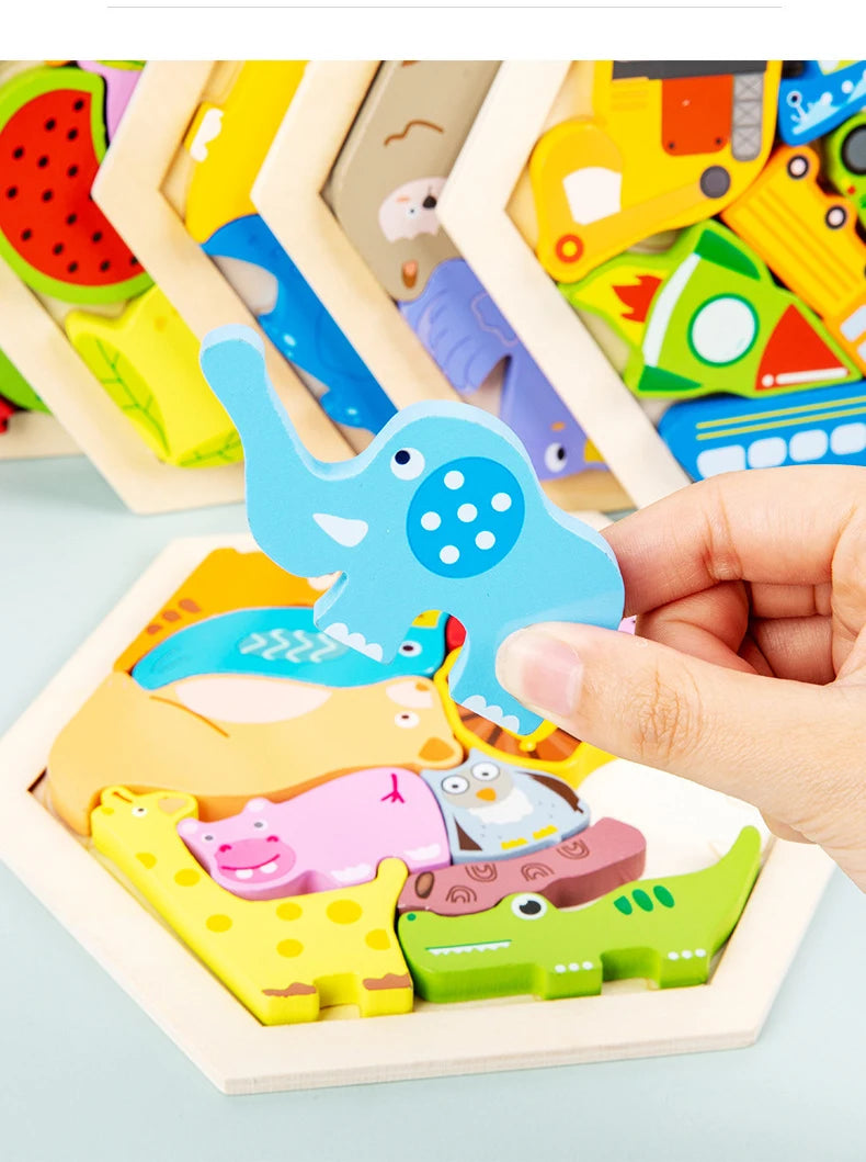 A hand places a blue elephant wooden jigsaw puzzle among other colorful animal puzzles.