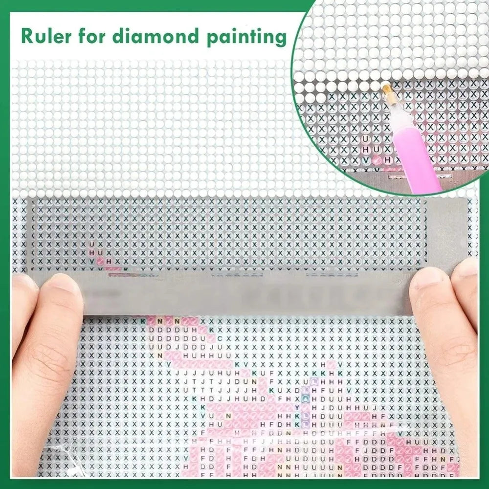 Stainless steel cross ruler used for diamond painting, showing a grid pattern and a paint dropper.