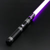A black lightsaber with a white blade that transitions to purple, featuring metallic accents.