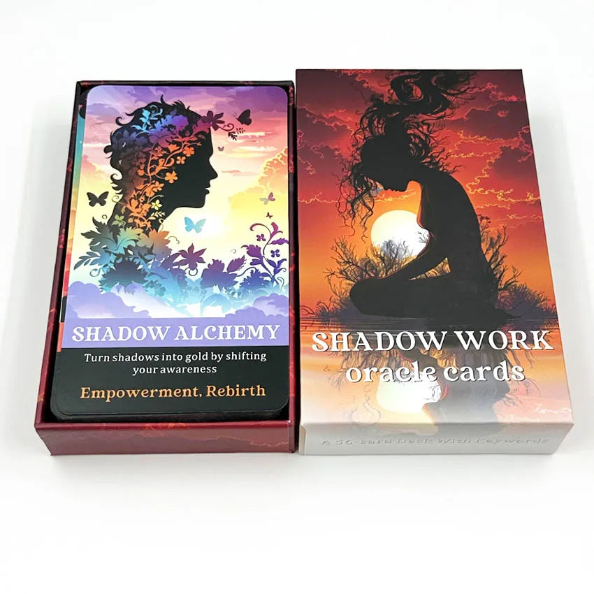 A box set of Shadow Work Oracle Cards featuring artwork depicting a silhouette and nature elements against an orange sunset b