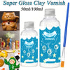 A bottle of Super Gloss Clay Varnish with a brush and various clay items.