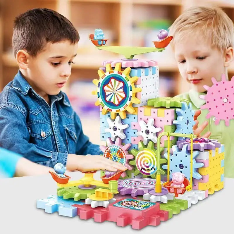 A colorful set of motorized gear building blocks featuring various gears and a rail car, being played with by a child.
