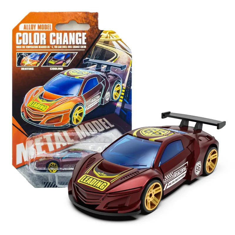 A red pull-back racing car model with yellow accents, shown next to its packaging.