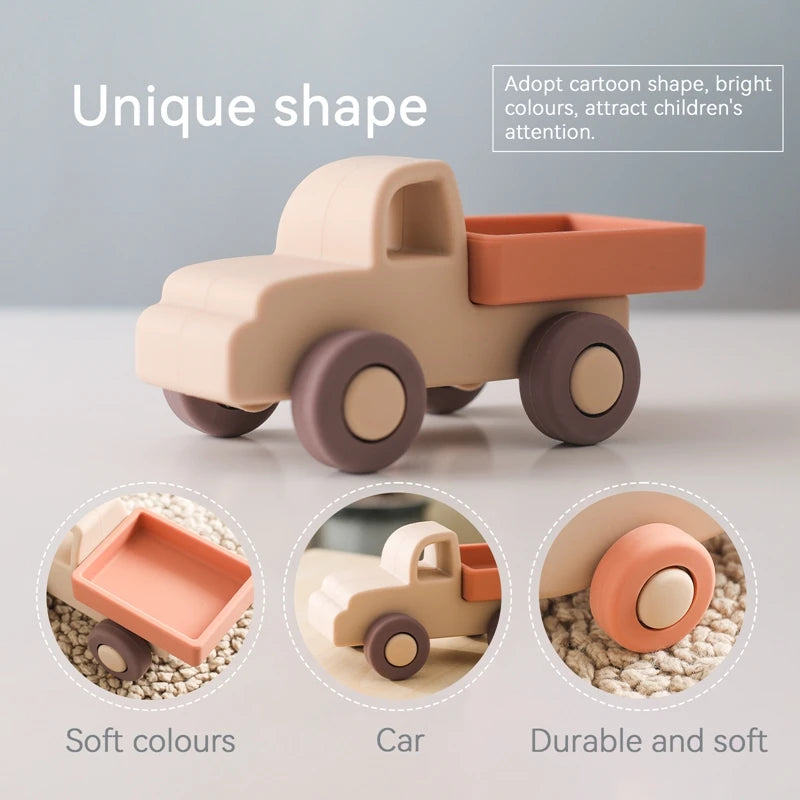 A beige cartoon car shaped silicone toy for babies with soft colors and durable features.