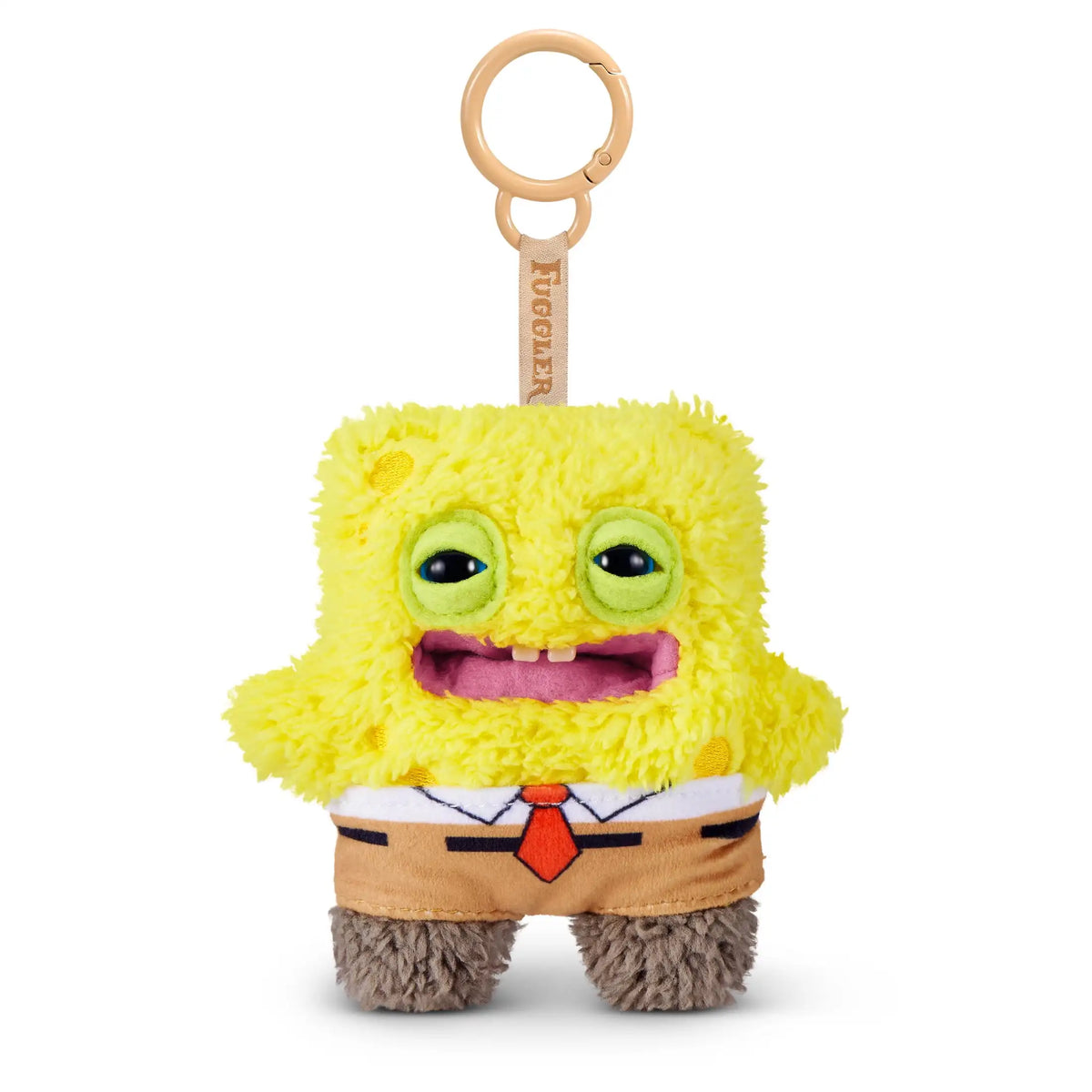 A yellow plush monster with large eyes and a mouth, wearing a brown outfit, attached to a wooden keychain.