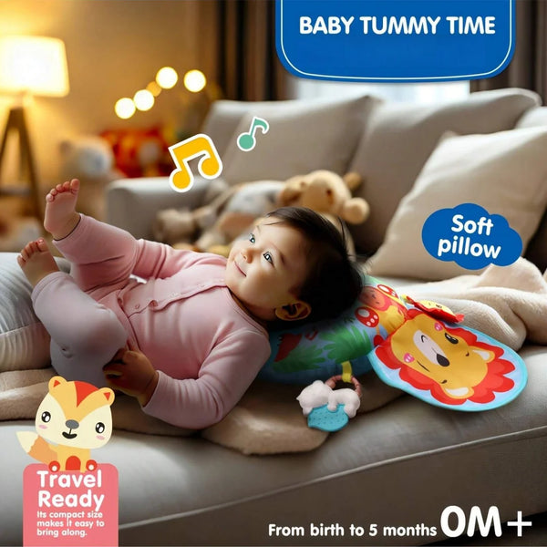 A baby is engaged in tummy time on a soft pillow with colorful toys and a yellow lion mat.