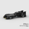A black classic rally car model built from LEGO bricks.