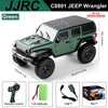 Green JJRC C8801 Jeep Wrangler RC car with accessories and box