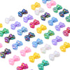 A collection of colorful acrylic bow beads in various shades including pink, purple, blue, and green.