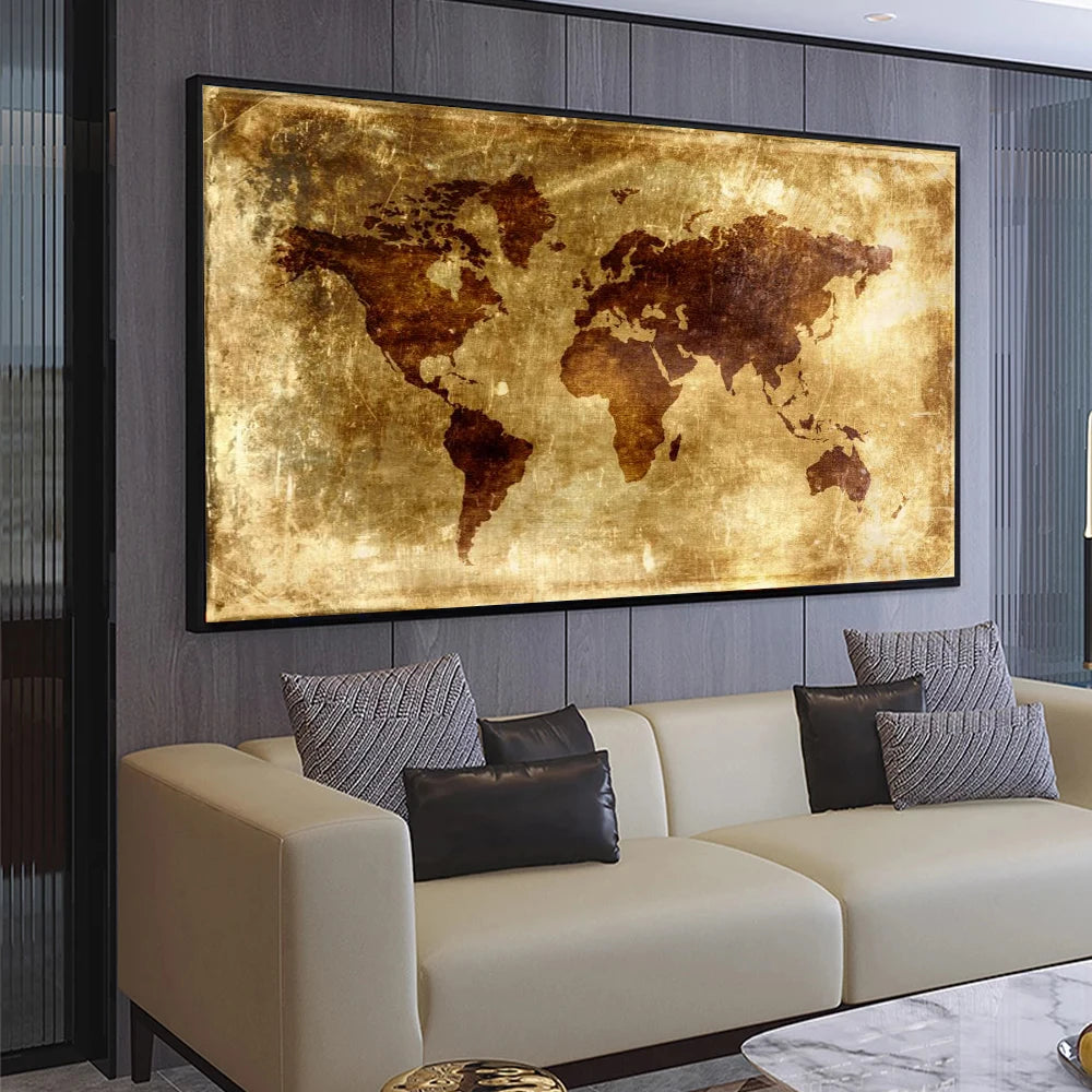 A living room scene featuring a large framed map of the world above a beige sofa.