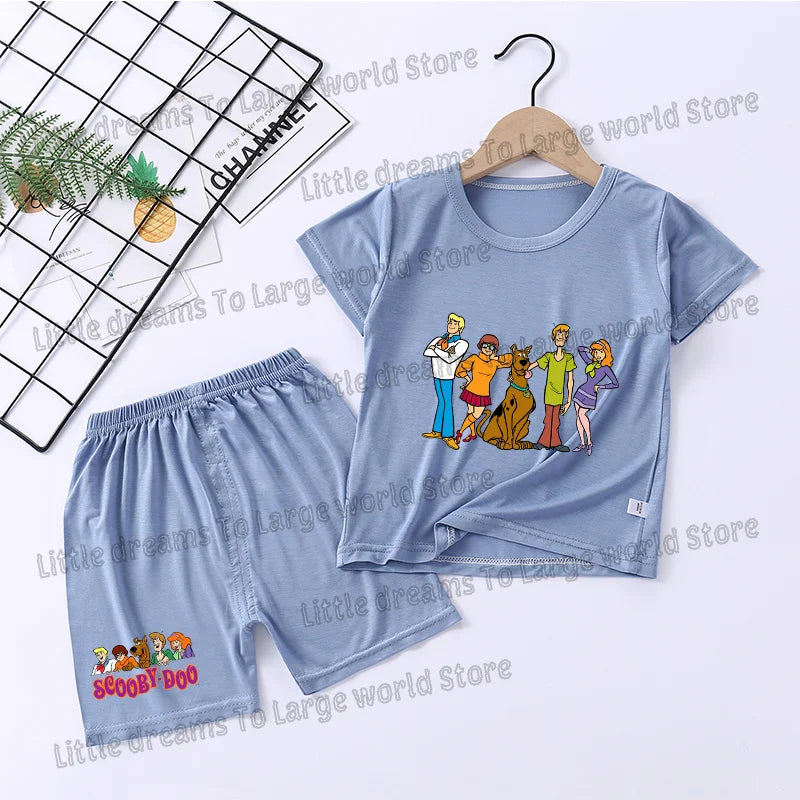 A light blue short sleeve t-shirt and matching shorts set featuring Scooby-Doo characters for kids