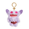 A purple plush monster keychain with pink eyes and a pink patterned belly.