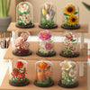 A collection of glass terrariums filled with miniature flowers and greenery displayed on a wooden shelf.