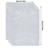 A stack of five sheets of gradient polka dot rhinestone sticker material.