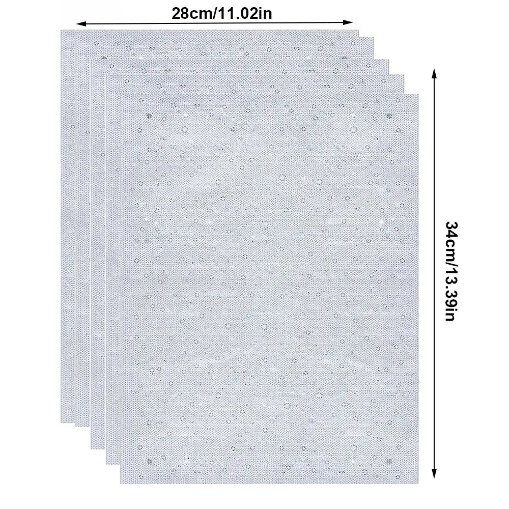 A stack of five sheets of gradient polka dot rhinestone sticker material.