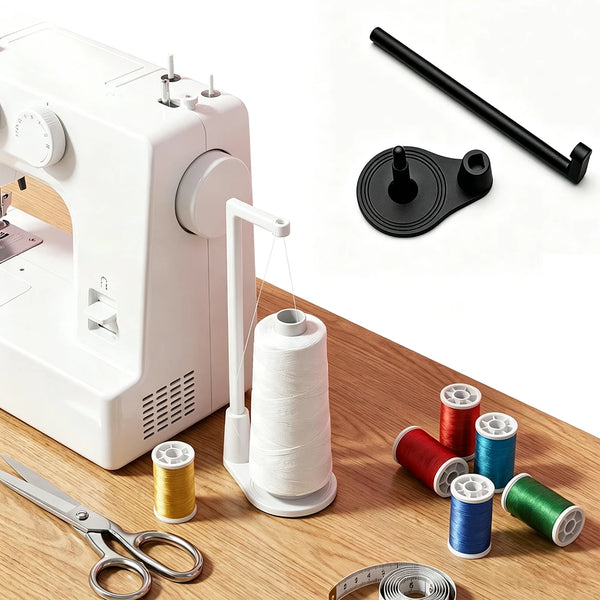 A white vertical sewing machine with a spool holder and thread guide, along with several spools of thread.
