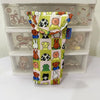 A yellow and green magnetic storage bag featuring various cartoon animal characters for kids.