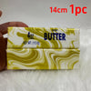 A package of 4oz salted butter squishy toys in a marbled yellow and white design.
