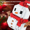 A close-up of a white and red Santa face built from LEGO-style micro building blocks.
