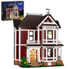 A detailed model kit of Halliwell Manor featuring a two-story house with red siding and white trim.
