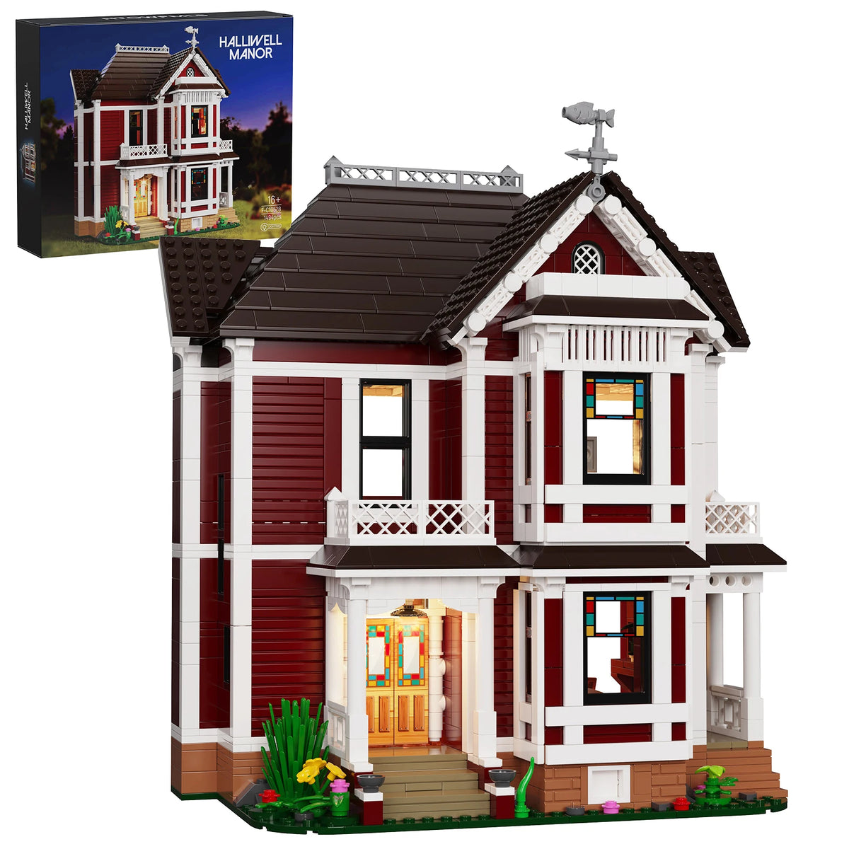A detailed model kit of Halliwell Manor featuring a two-story house with red siding and white trim.