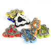 A collection of colorful metal fidget toys resembling bike roller chains.